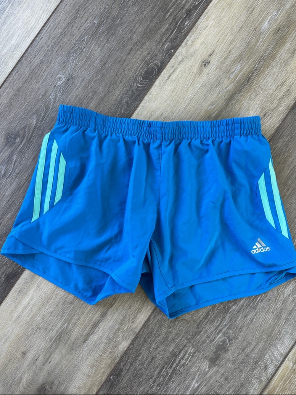 Women’s adidas Blue Athletic Shorts with Mint Stripe Accents